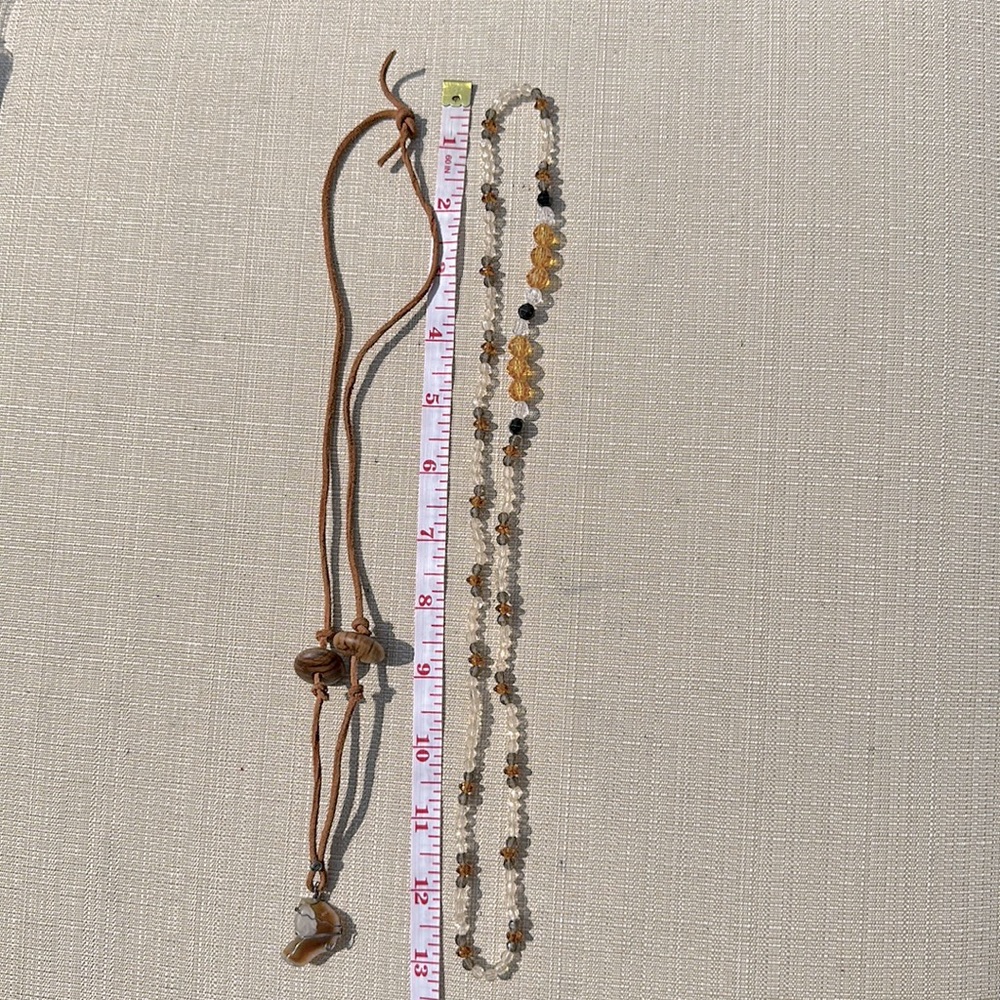 Two fashion necklaces with real stone center and wood accent side beads. Vintage
